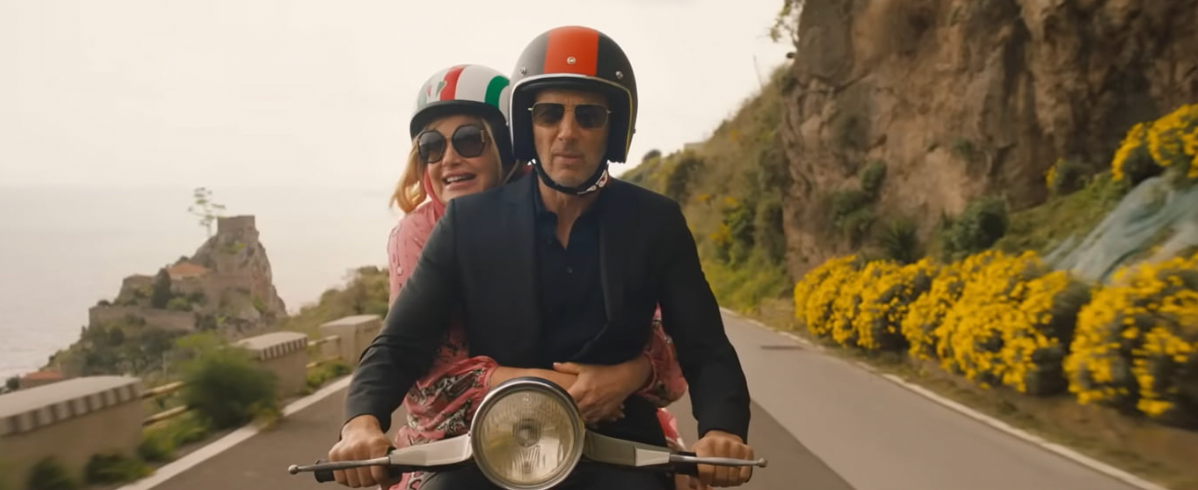 Tanya and Craig From The White Lotus HBO Show On a Vespa In Sicily