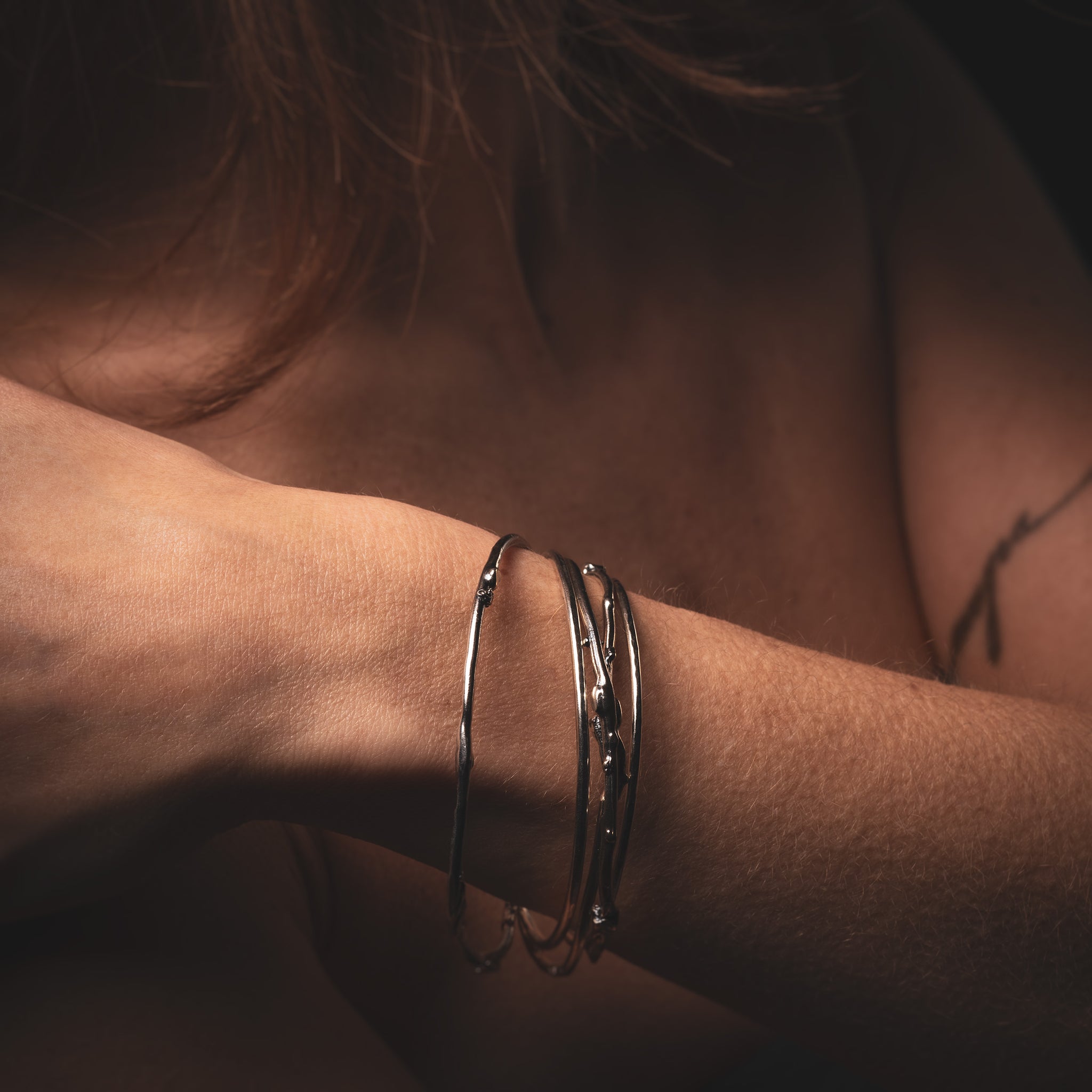 Cefalu Bangle Bracelets on Women Model